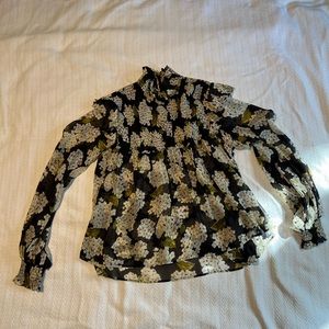 Adorable Koople blouse.